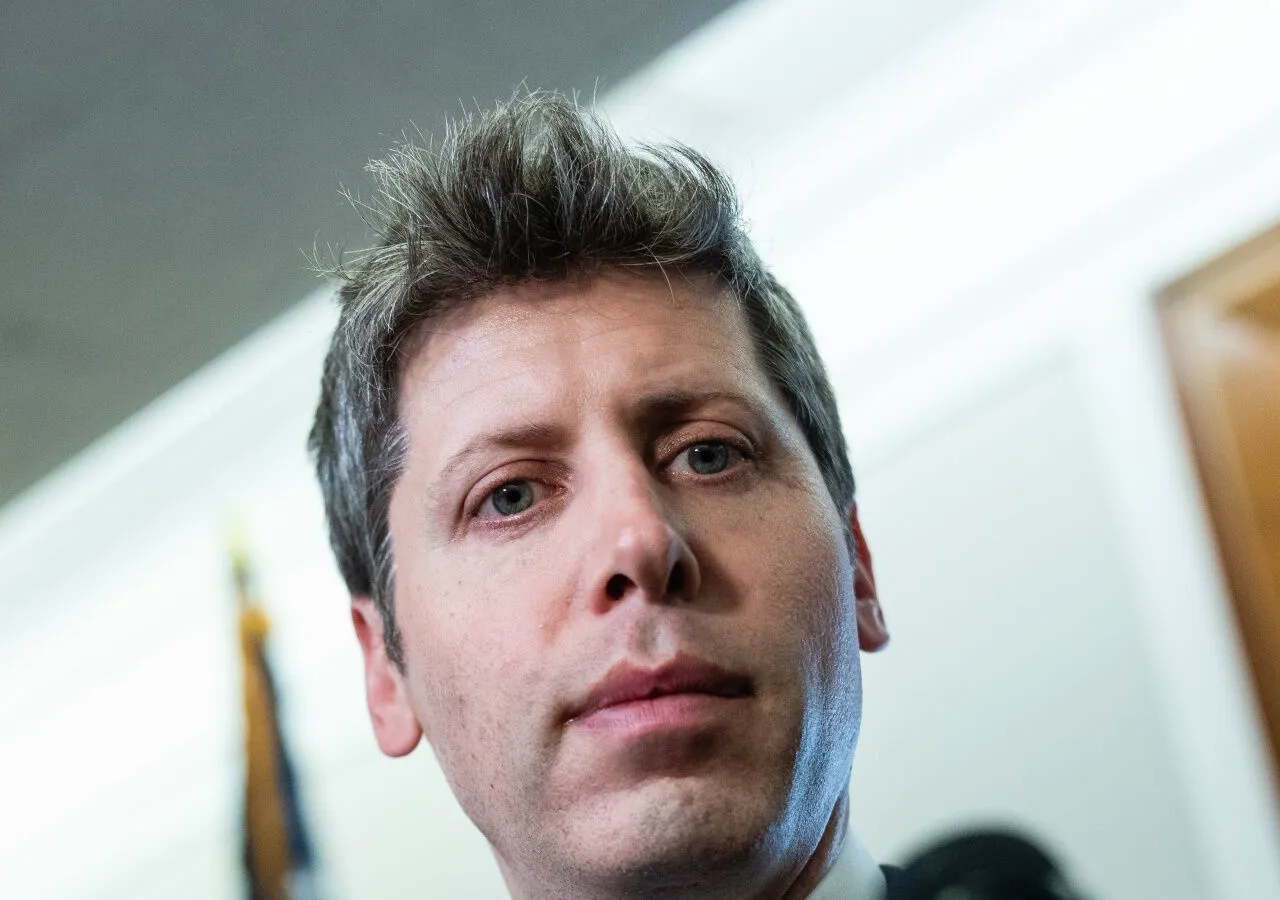 Sam Altman at press conference — source: Eric Lee/Bloomberg via LA Times