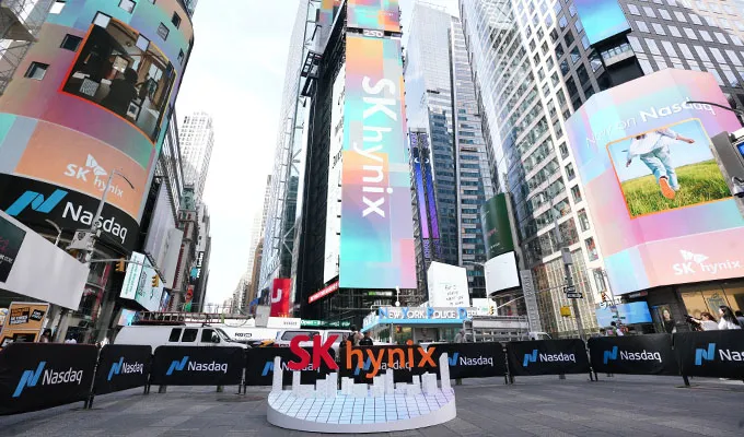 SK Hynix branded Times Square roadblock campaign with Nasdaq logos on the trading day of its record ADR listing, July 10, 2026.